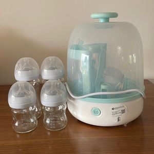 BRAND NEW never used glass bottles and sterilizer